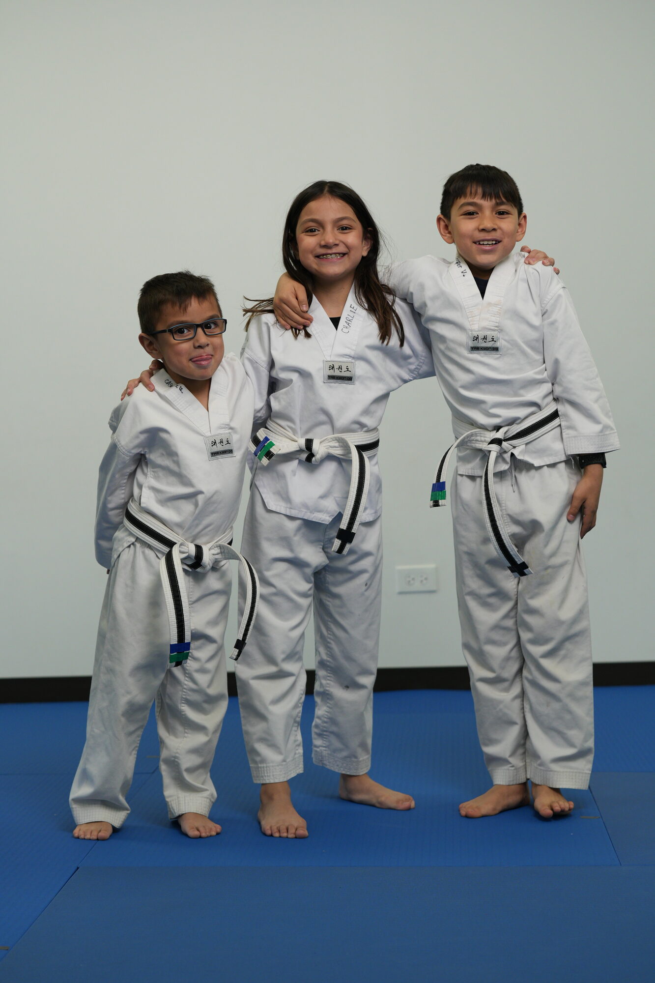 Students practicing Taekwondo forms
